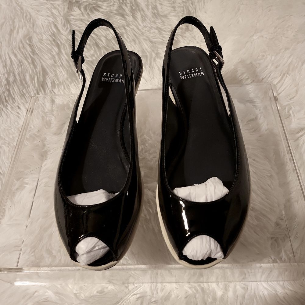 Stuart Weitzman sling back, black patent ,peep toe ,soft sole ,gently pre loved